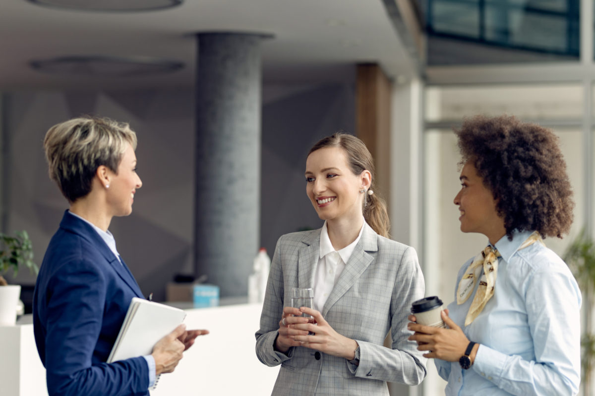 Businesswomen standing and talking